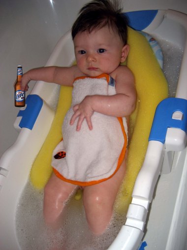 Henry lounges in the tub