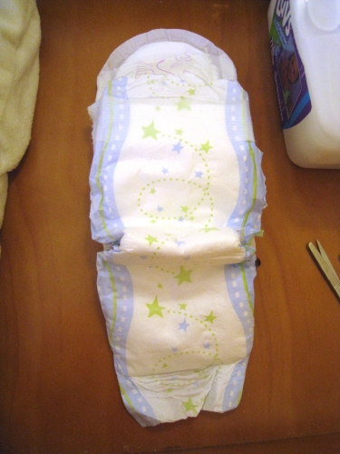 Reverse view of diaper with Poise pad